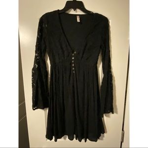 Lace-sleeved black dress